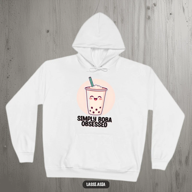 Funny cheerful cup of boba tea with a straw wiggling joyfully on a hoodie, perfect for comfort.